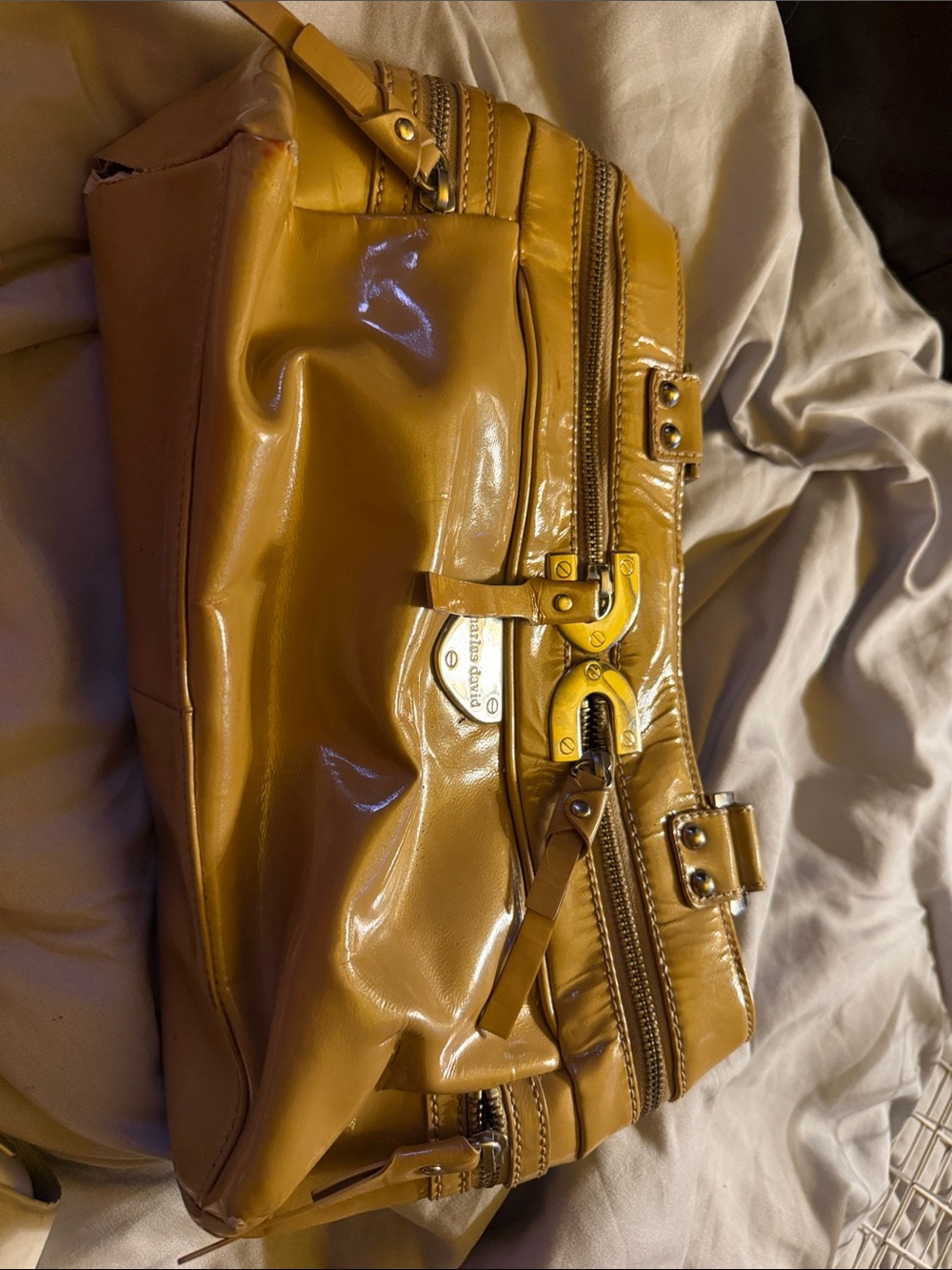 Charles David glossy mustard shoulder bag with gold hardware